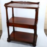 A Victorian mahogany 3-tier buffet, with central drawer and turned columns, width 77cm, height 97cm,