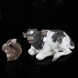 Royal Copenhagen calf, length 16cm, and a Danish porcelain squirrel, height 6.5cm (2)