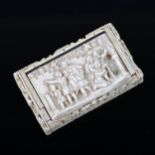 An 18th century snuff box, composed with earlier ivory plaques, including a relief carved