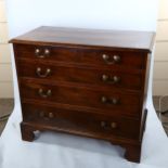 George III mahogany chest of 4 long graduated drawers, with brass drop handles and bracket feet,