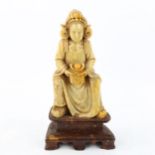 A Chinese carved soapstone seated figure, on soapstone base, height 20cm - BBC Antiques Road Trip