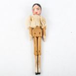 A carved and painted wood jointed doll, length 25cm - BBC Antiques Road Trip