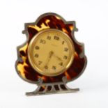 WALKER & HALL - a silver and tortoiseshell 8-day travelling strut clock, hallmarks Birmingham