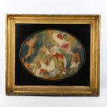 An 18th century crewel embroidered picture, depicting a biblical scene, in original black glass