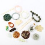 A group of Oriental items, including jade bangles, Peking glass snuff bottle, beads etc