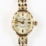 SOVEREIGN - a lady's 9ct gold quartz bracelet watch, champagne dial with gilt baton hour markers and