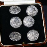 A set of 6 Edwardian silver buttons, relief embossed lover decoration, by Levi & Salaman,