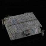 A Peruvian silver Aztec casket, allover engraved decoration with totem legs, marked Peru 900,