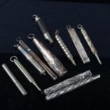 Various propelling pencils and whistles, including 5 silver examples