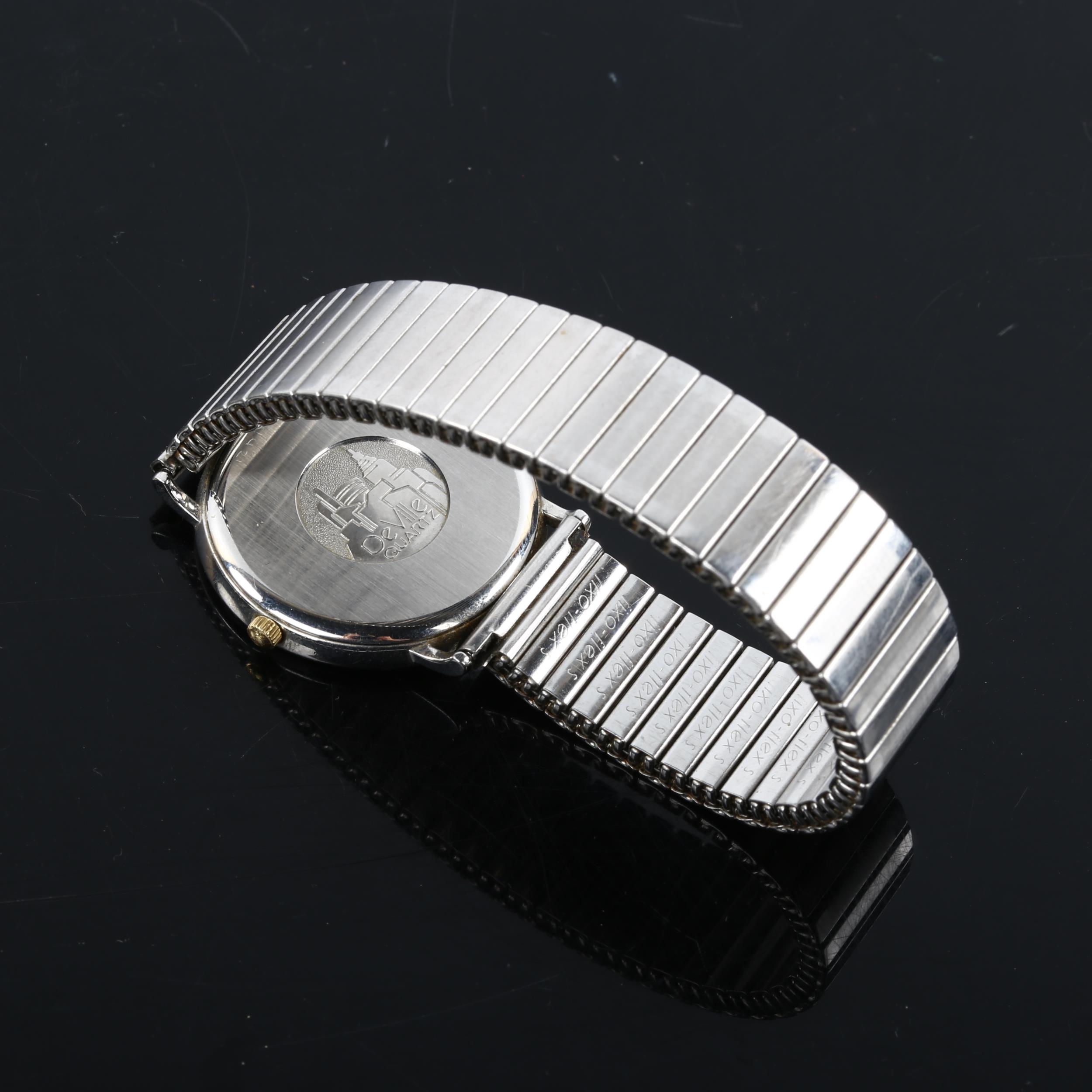 OMEGA - a stainless steel Deville quartz bracelet watch, ref. 196.0312, silvered dial with gilt - Image 3 of 5