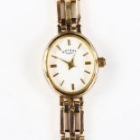 ROTARY - a lady's 9ct gold quartz bracelet watch, white dial with gilt baton hour markers and 9ct