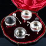 An Edwardian silver 4-piece salt cellar cruet set, bulbous circular form with gadrooned rims and