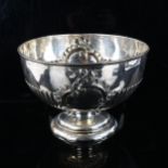 A late Victorian silver pedestal punch bowl, relief embossed half fluted decoration, by George