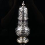 A George II silver baluster sugar caster, relief embossed foliate decoration, by Thomas Bamford,