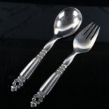 GEORG JENSEN - a pair of Danish sterling silver Acorn (Konge) pattern salad servers, length 21.