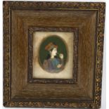 Indian School, miniature painted portrait on ivory, woman with a flower, unsigned, framed, overall