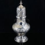A Victorian silver baluster sugar caster, allover relief embossed foliate decoration, by Sibray,