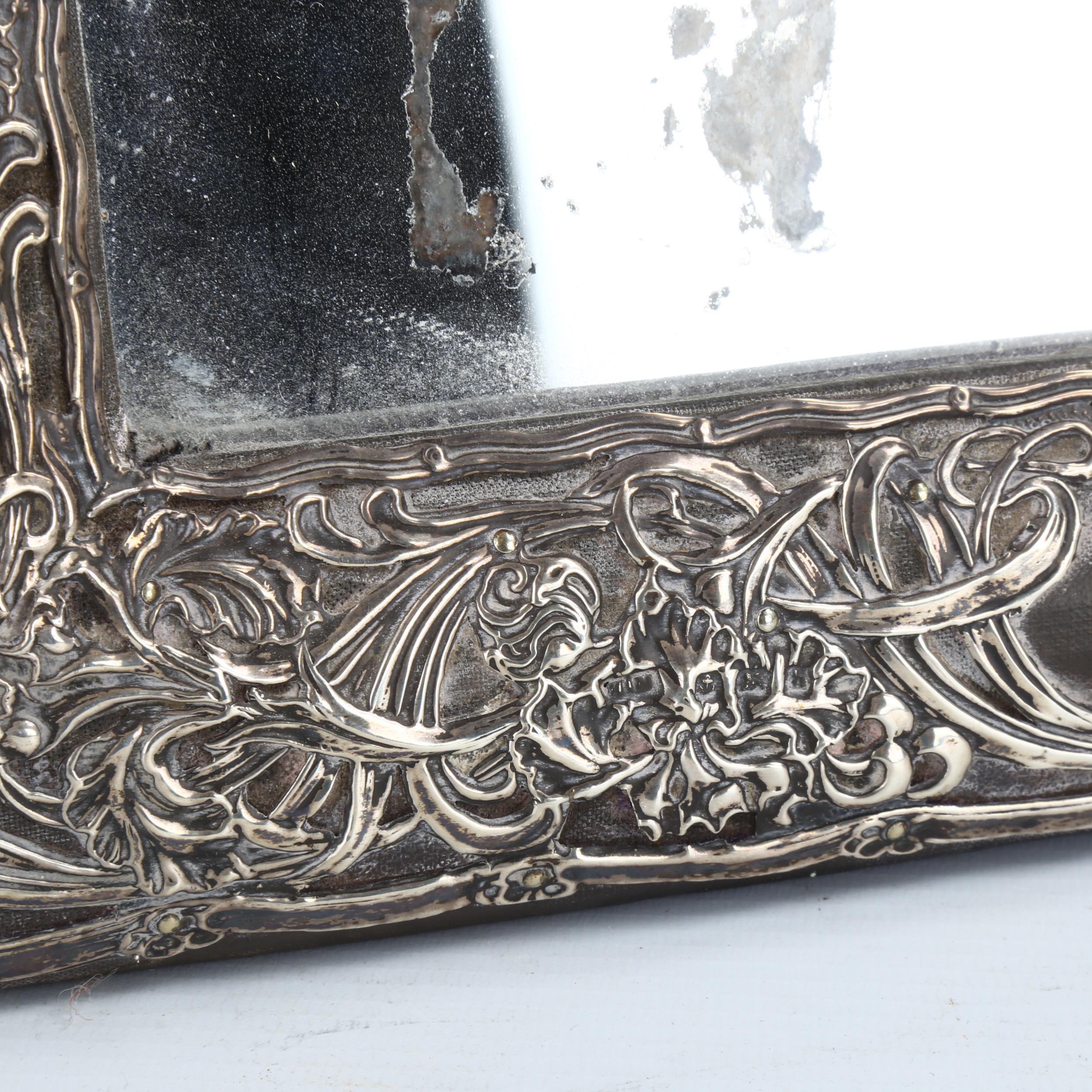 A large Edwardian silver-fronted rectangular dressing table strut mirror, embossed floral decoration - Image 2 of 2