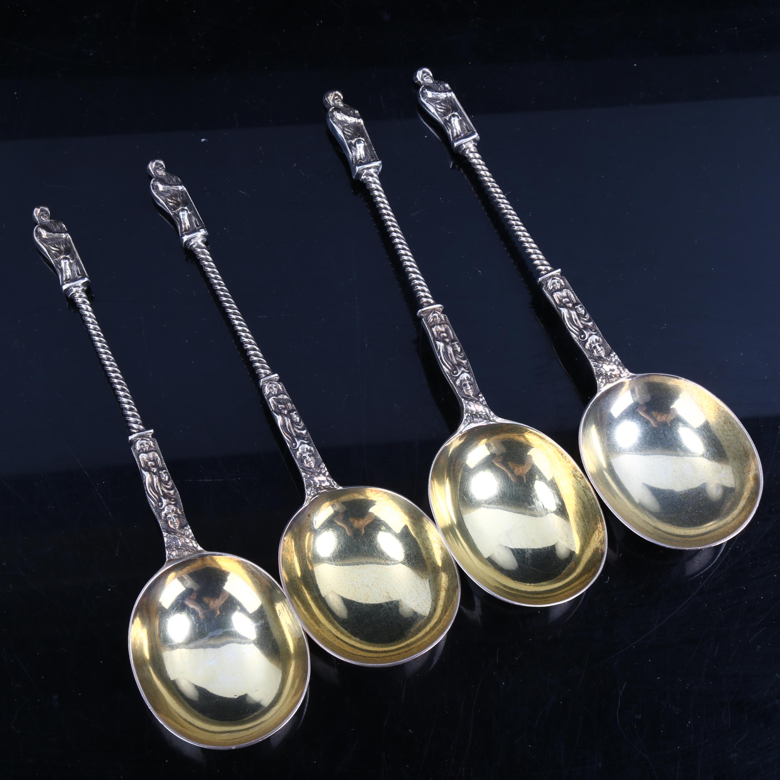 A set of 4 Victorian silver Apostle spoons, with twisted stems and gilded bowls, by Henry John