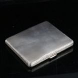 A George V square silver cigarette case, allover engine turned decoration with foliate border, by