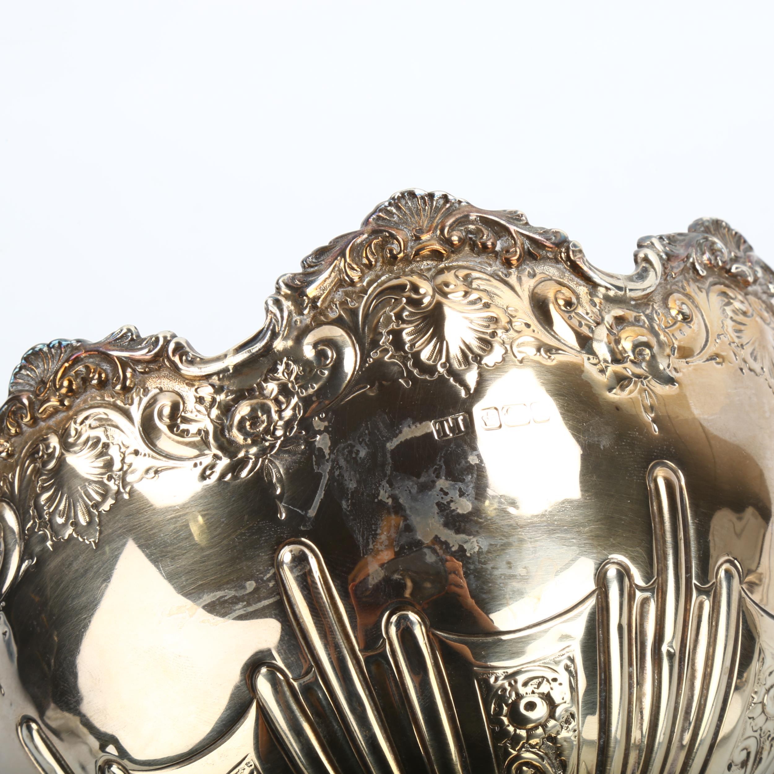 A small Edwardian silver pedestal fruit bowl, relief embossed foliate and fluted decoration, by - Image 2 of 2