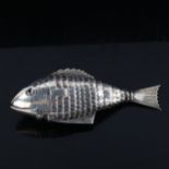 A Continental silver articulated fish box, with blue glass eyes and secondary mouth compartment,