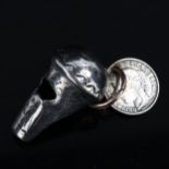 An early 19th century miniature silver whistle, bright-cut engraved decoration, maker's marks IT,