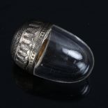 A miniature French silver-mounted glass egg vinaigrette, engraved and engine turned decoration, with