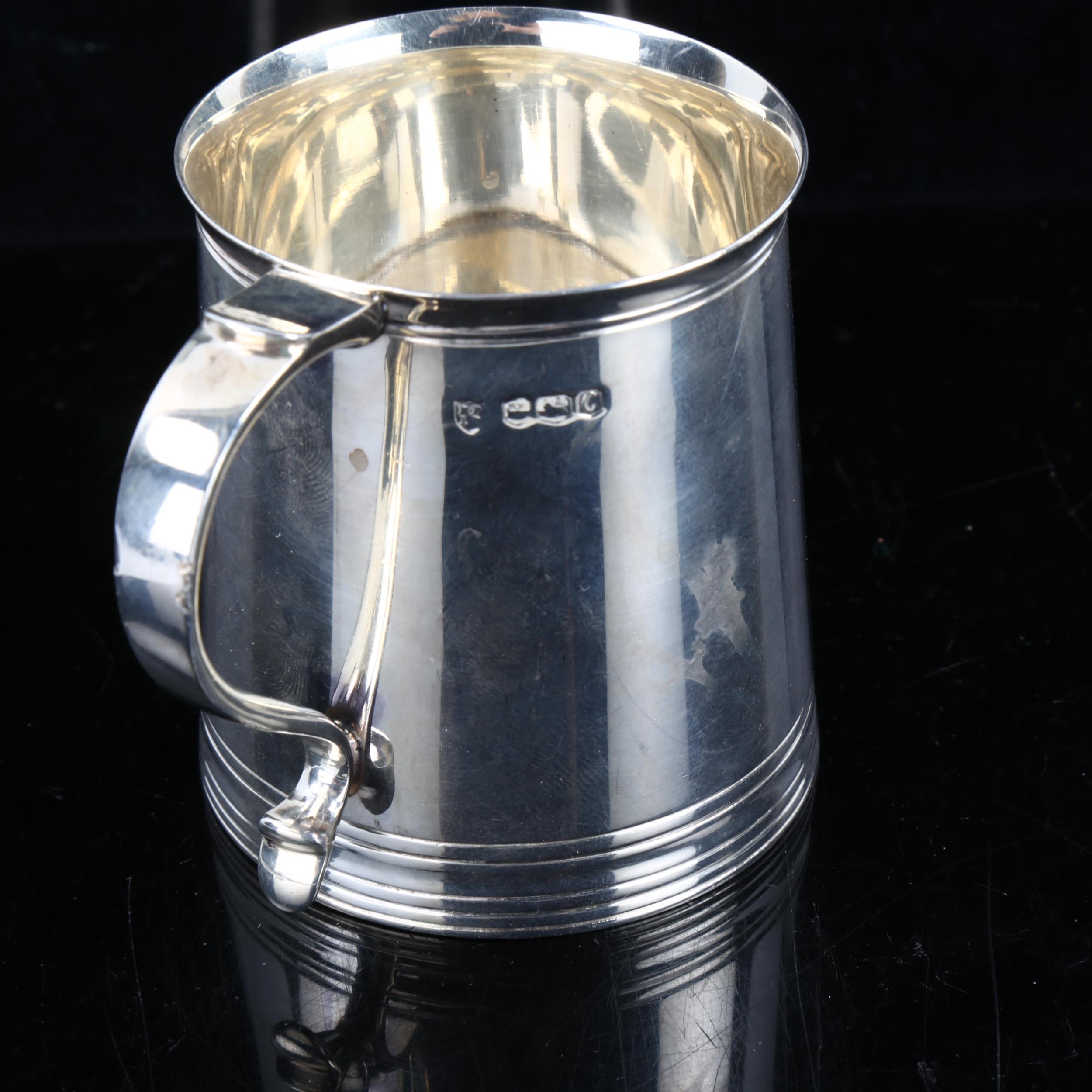 An Edwardian silver christening mug, in Charles II style, by Tessiers Ltd, hallmarks Sheffield 1920, - Image 2 of 2