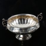A Victorian silver 2-handled pedestal trophy bowl, with relief embossed Adams style swag decoration,