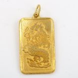 A Chinese 9999 gold dragon ingot pendant, character marks verso, pendant height excluding bale 27.