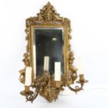 A 19th century gilt-brass framed Classical design wall mirror, converted to electric, with triple