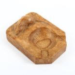 A Robert "Mouseman" Thompson carved oak ashtray, length 10cm Some watermarks in bowl and around
