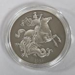 A 2002 St George and the Dragon silver proof coin, nr 003 of 300, 5oz With capsule, box and