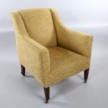 Howard & Son upholstered armchair, on tapered legs with brass casters, stamped on back leg serial