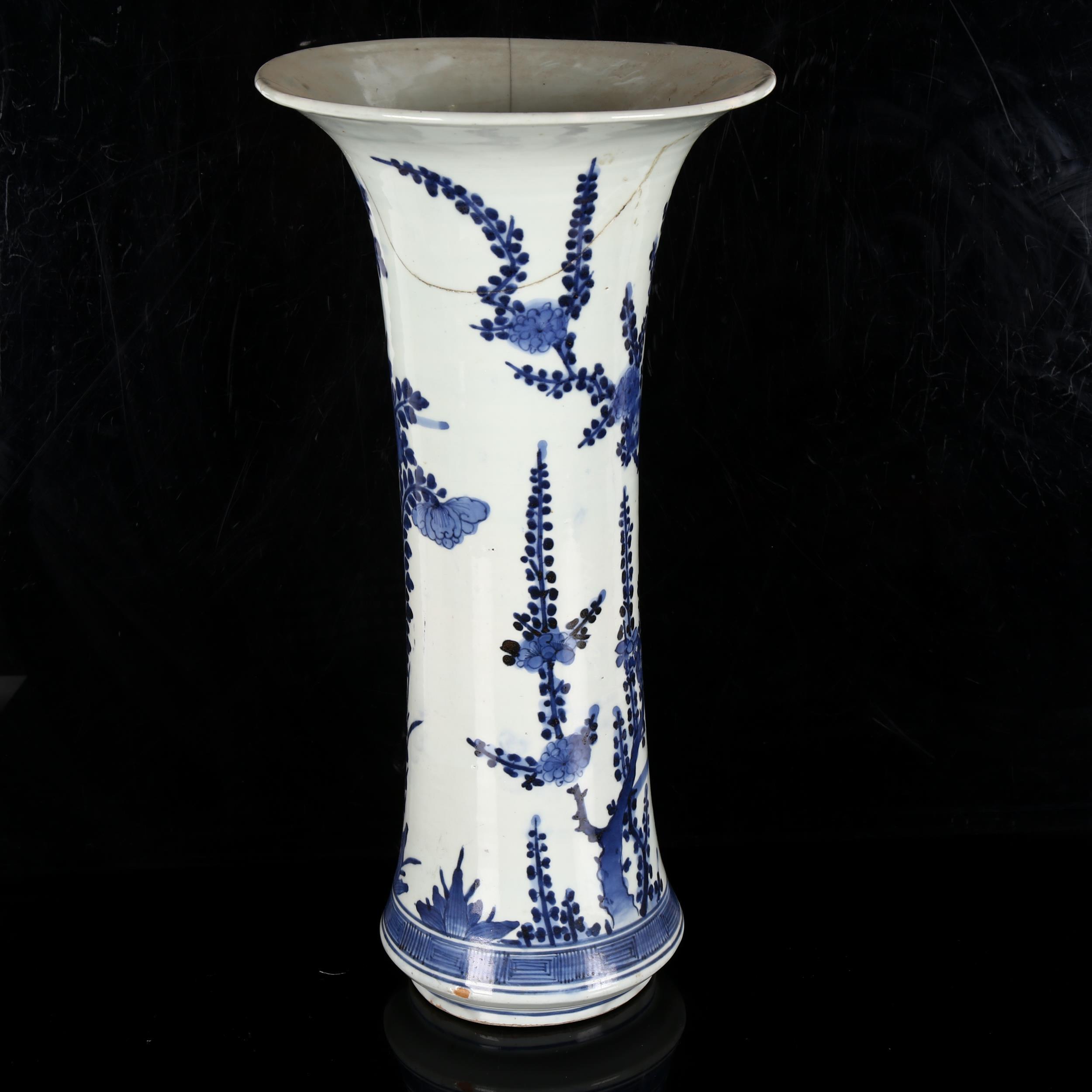 A Chinese blue and white beaker vase, 19th century, decorated in underglaze blue with floral sprays, - Image 2 of 11