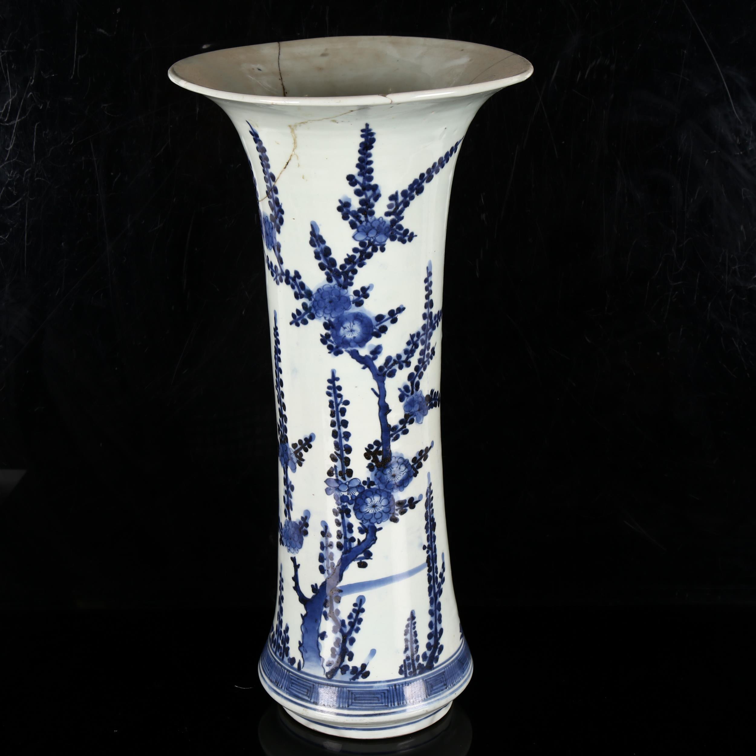 A Chinese blue and white beaker vase, 19th century, decorated in underglaze blue with floral sprays, - Image 3 of 11