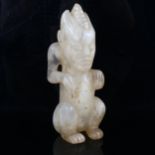 A Chinese Hongshan culture rock crystal sculpture of a crouching beast, height 20cm, provenance: the