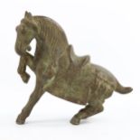 A Chinese heavy patinated bronze saddled horse, length approx 21cm, height 21cm, probably 19th