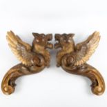 A pair of 19th century carved wood and parcel gilt winged griffon ornaments, length approx 37cm,