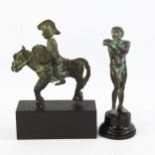 A bronze horse and rider and a bronze Pan figure, mounted on modern plinths, tallest 12cm