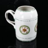 An 18th century Chinese export porcelain tankard, double entwined handles, with hand painted