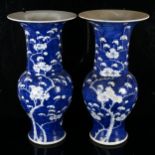 A pair of large Chinese blue and white 'Prunus' Yen-Yen vases, decorated in underglaze blue with