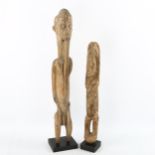 2 African Dogon Tribal carved wood fertility figures, largest height 63cm (2) A few age-related