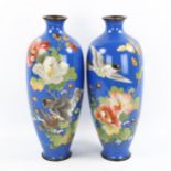 A pair of Japanese cloisonne enamel vases, circa 1900, highly detailed birds of prey and flowers,