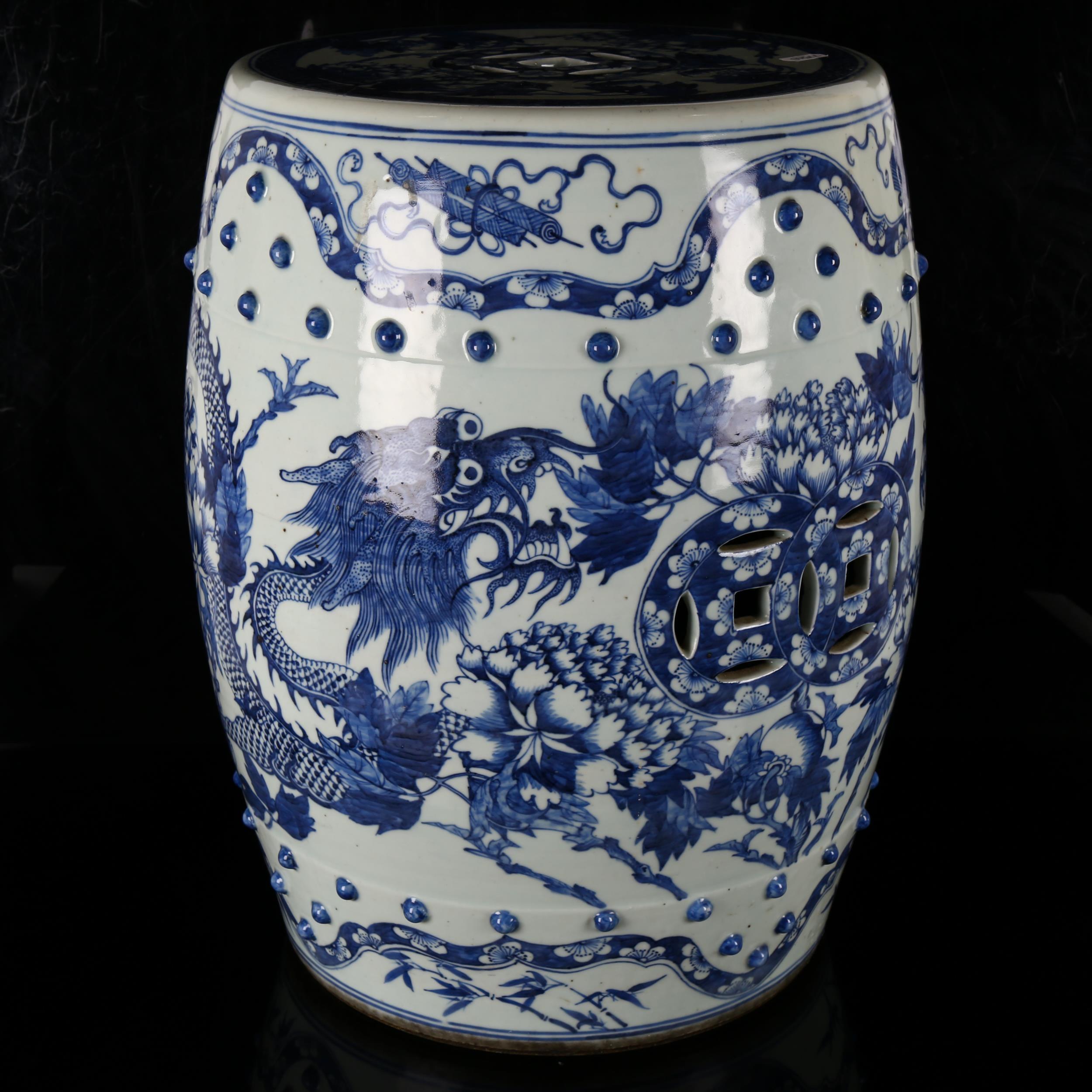 A Chinese blue and white 'Dragon' garden barrel seat, 19th century, underglaze blue decorated with