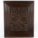 An Antique fine relief carved oak Classical panel, probably 18th century, with raised griffon and