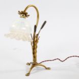 A Victorian brass bulrush design desk lamp, with moulded vaseline glass shade, height 41cm, shade