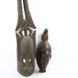 African Dogon Tribal carved wood mask, height 37cm, and another African carved wood horned mask,