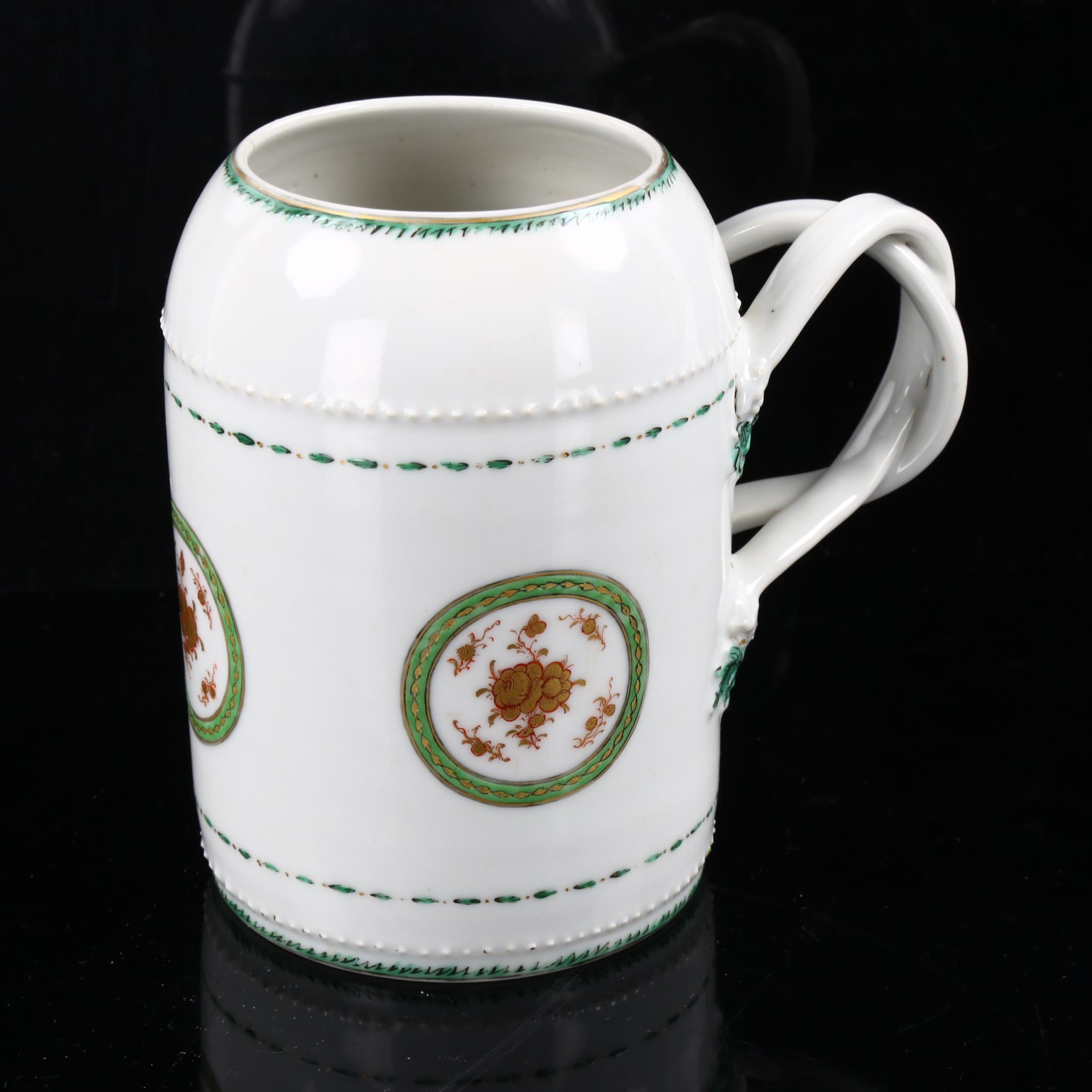 An 18th century Chinese export porcelain tankard, double entwined handles, with hand painted - Image 2 of 3